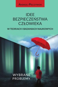 Seledynowe tło, metaforyczny las, czerwona postać po czerwonym parasolem, czarne liternictwo