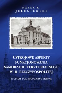 Granatowa okładka z czarnym liternictwem, w białej ramce zdjęcie historycznego budynku starostwa powiatowego z 1919 roku